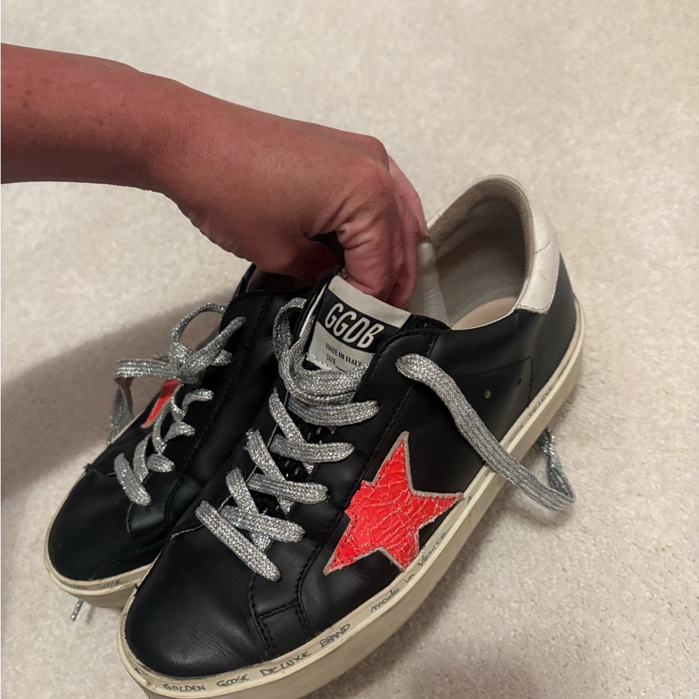 Golden Goose Black Sneakers with Vibrant Red Star
